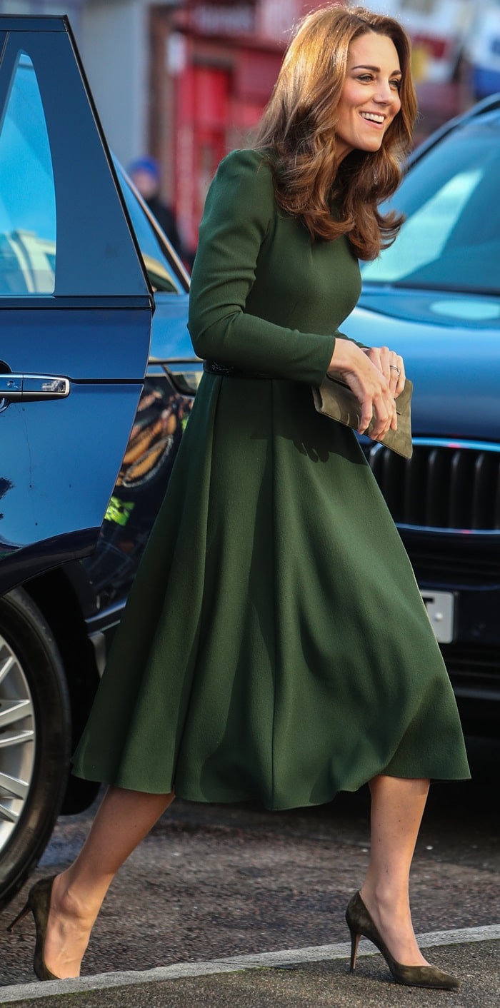 The Duchess of Cambridge in olive suede Gianvito Rossi pumps and a green midi dress by Beulah London