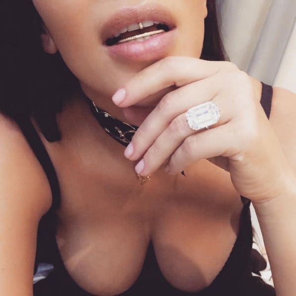 Kim Kardashian flaunts her massive Lorraine Schwartz diamond ring in an Instagram post, just days before the Paris robbery where the ring was stolen