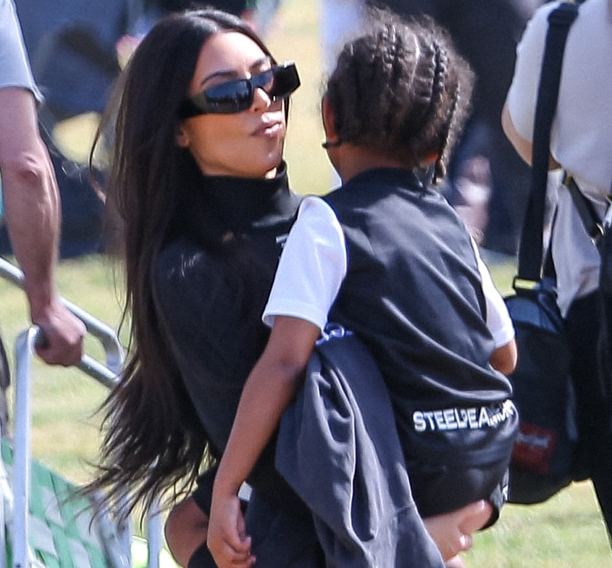 Kim Kardashian wore a Balenciaga black bike jersey top to show her support for Saint West's soccer game