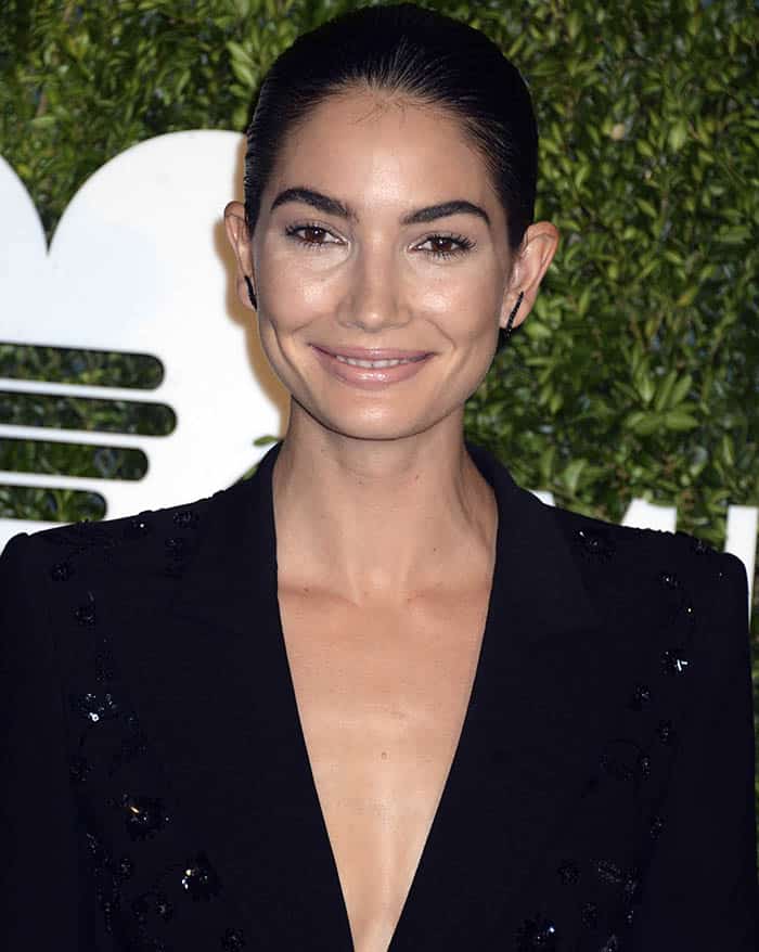 Lily Aldridge looks radiant with her sleek hair pulled back and subtle makeup