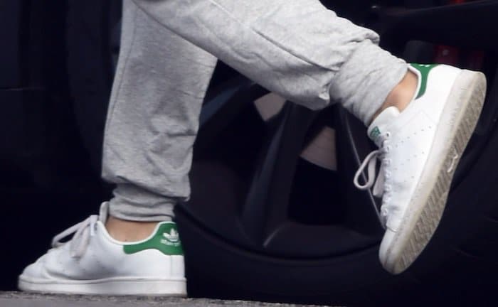 Mila Kunis walks comfortably in Adidas Stan Smith sneakers while running errands