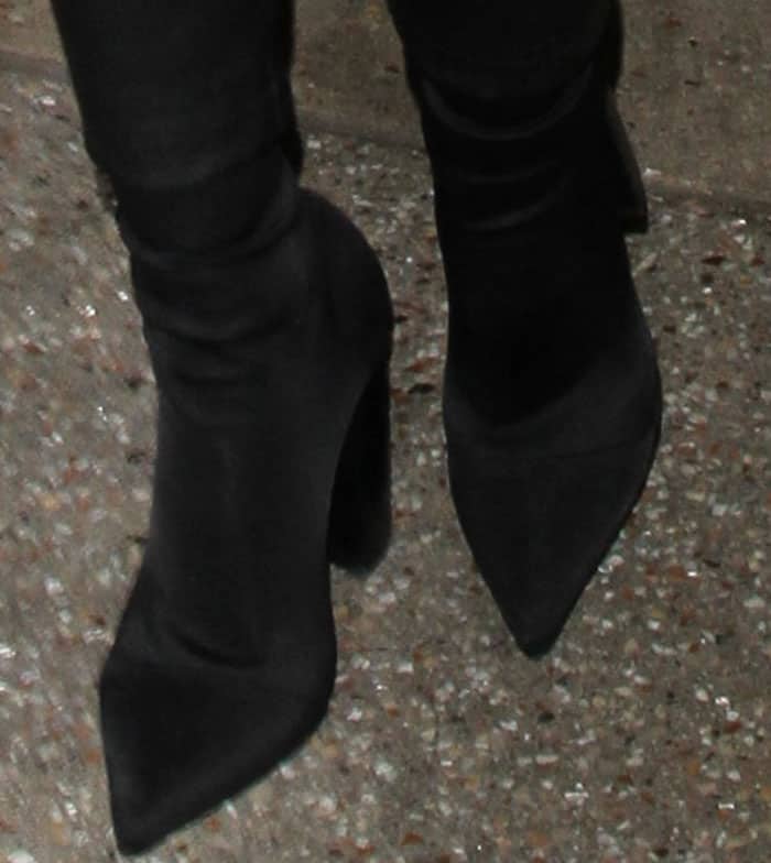 Miranda Kerr wore a pair of Tony Bianco 'Diddy' boots
