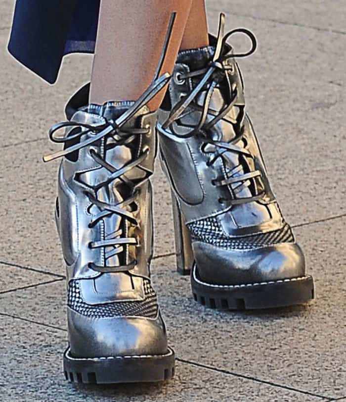 Miranda Kerr's choice of footwear was the standout "Digital Gate" boots by Louis Vuitton