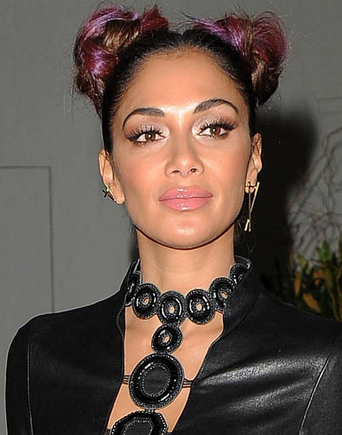 Nicole Scherzinger's hairstyle was equally eye-catching: she styled her pink-tinted hair into two high buns, drawing attention to her face