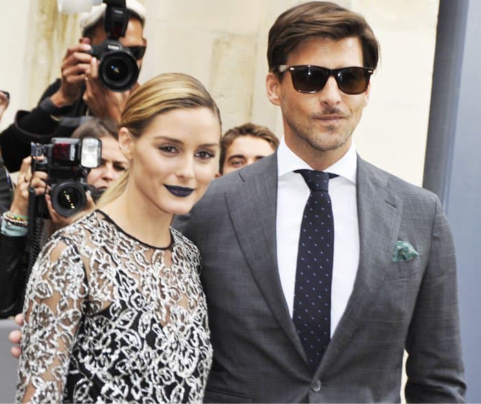 Olivia Palermo poses with her husband, model Johannes Huebl