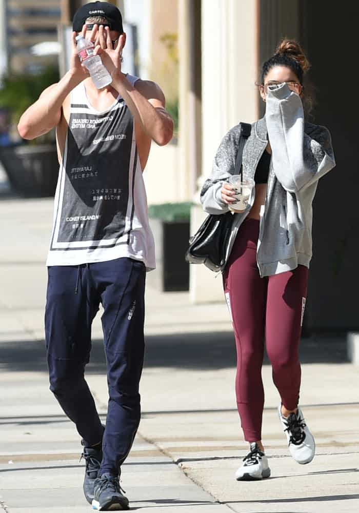 Vanessa Hudgens and Austin Butler avoid the paparazzi after finishing a workout in Los Angeles