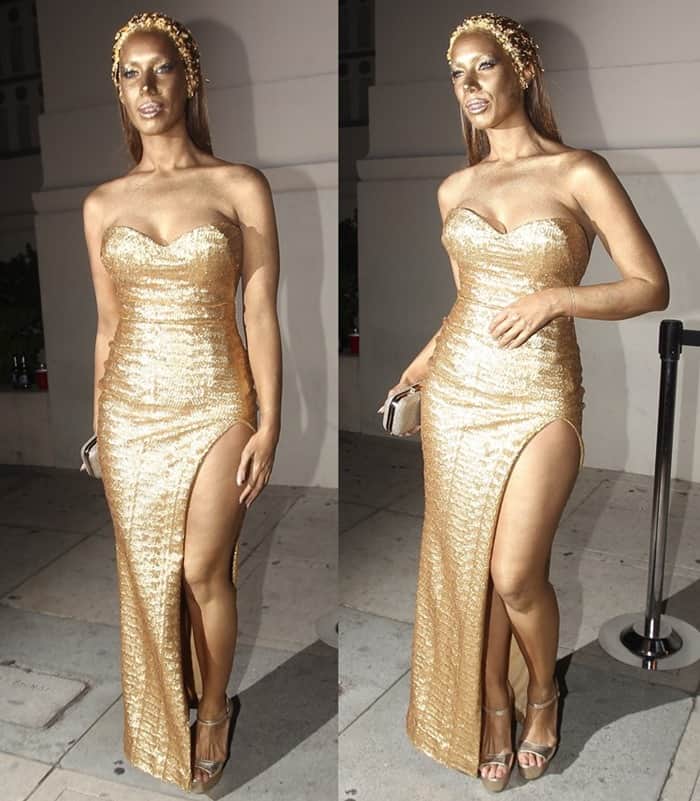 Leona Lewis stuns in a shimmering gold gown and metallic makeup, transforming into a dazzling golden statue for Halloween