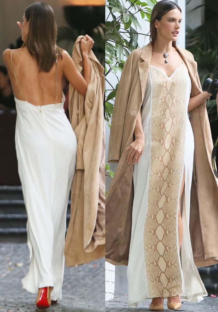 Alessandra Ambrosio stuns in a backless snakeskin dress paired with a suede trench coat and red-soled Christian Louboutin heels