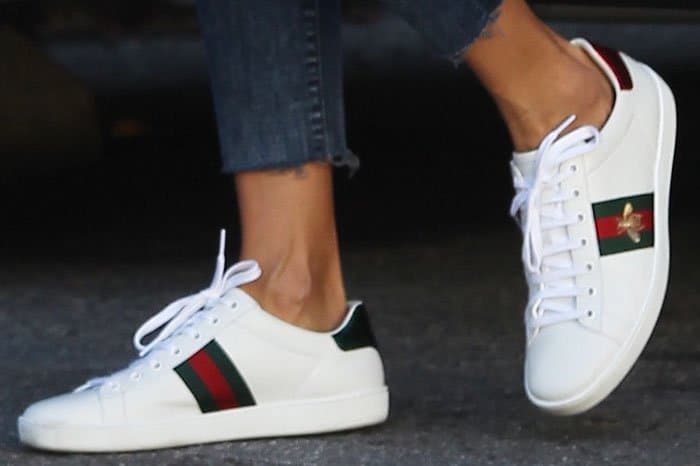 Alessandra goes for the low-key bee embroidery on her Gucci Ace sneakers