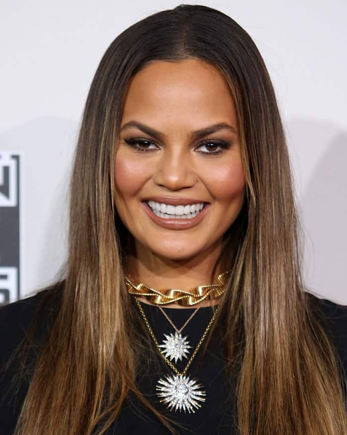 Chrissy Teigen's straight hair fell loosely over her shoulders