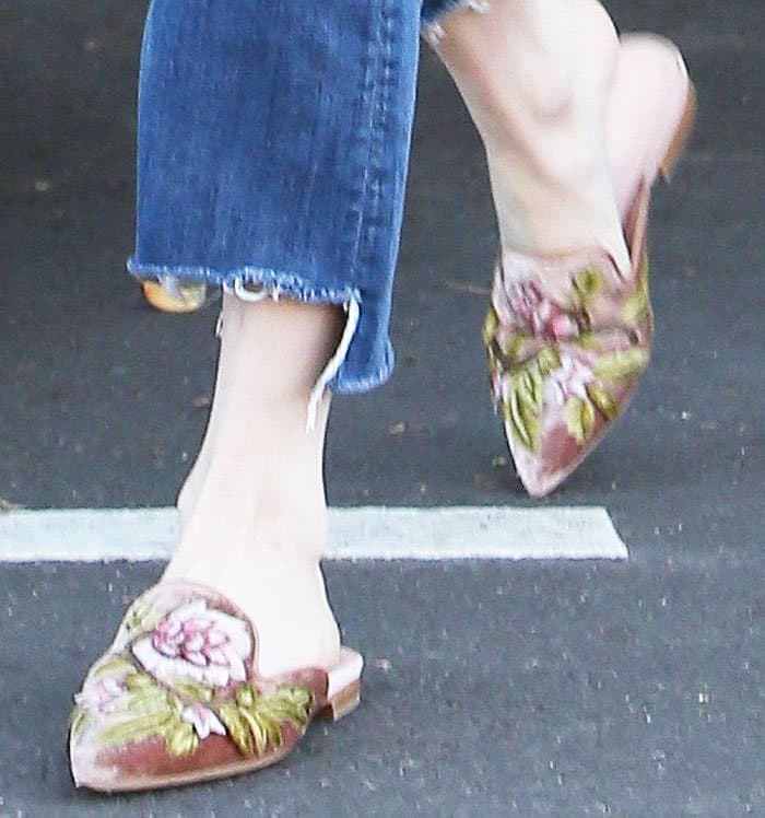 Emma spends a morning in the salon in her Alberta Ferretti slip-on embroidered mules