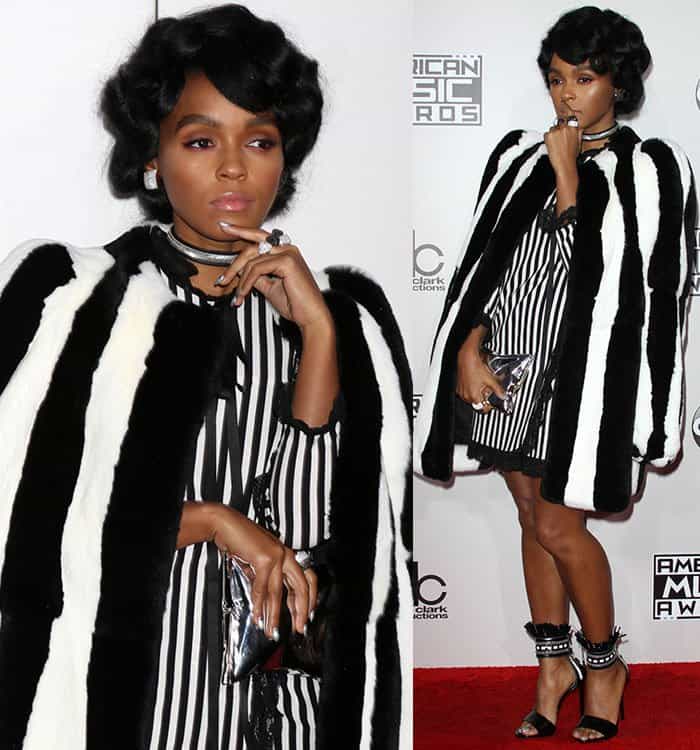 Elegantly poised, Janelle Monáe dazzles at the 44th Annual American Music Awards in a Marc Jacobs Resort 2017 monochrome striped dress, gracefully draped with a luxurious striped mink coat