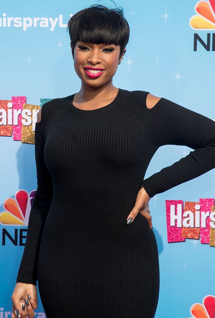 Jennifer Hudson stuns in a figure-hugging black ribbed knit dress with trendy cold-shoulder cutouts