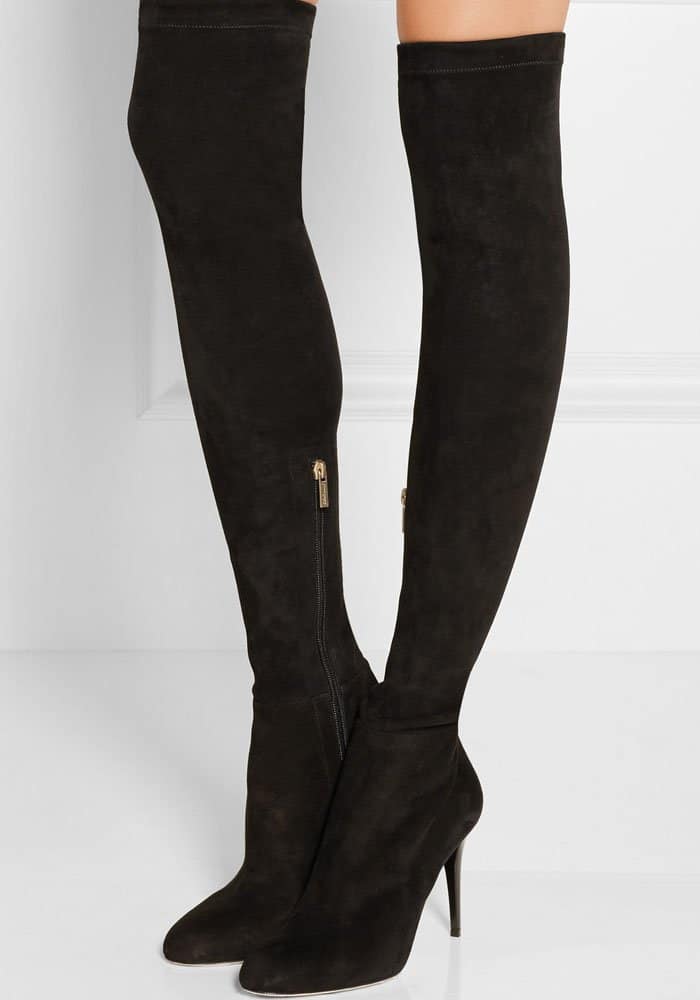 Jimmy Choo's over-the-knee boots in black suede are a blend of opulence and simplicity