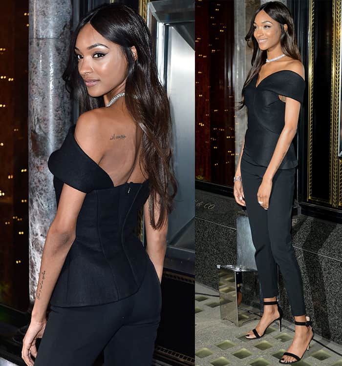 Jourdan Dunn shows off her Arabic font shoulder tattoo a black Brandon Maxwell off-the-shoulder top