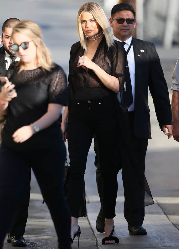 Khloe Kardashian's sexy mesh blouse atop the skinny jeans