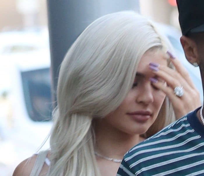 Kylie Jenner sparks engagement rumors as she is spotted wearing a large diamond ring during a casual outing with Tyga