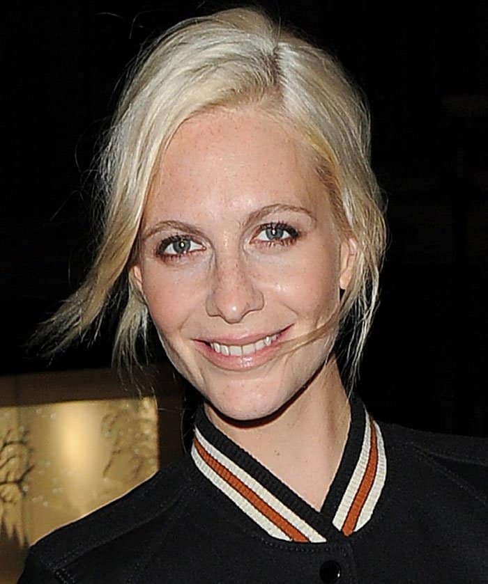 Poppy Delevingne keeps it simple with a messy blonde ponytail and natural, barely-there makeup
