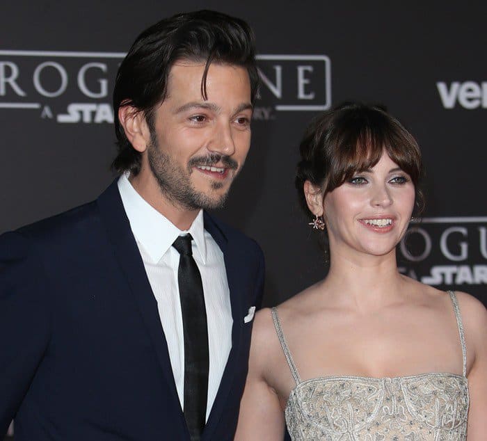 Felicity Jones and Diego Luna shared a joyful moment on the red carpet at the Rogue One: A Star Wars Story premiere