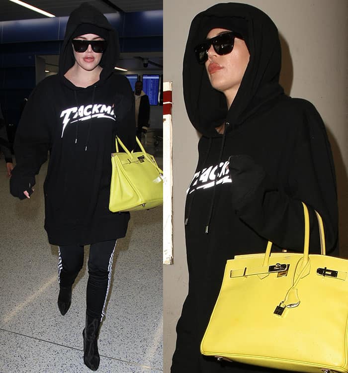 Khloé Kardashian totes a yellow lime bag from the Hermès Candy Collection at Los Angeles International Airport (LAX)