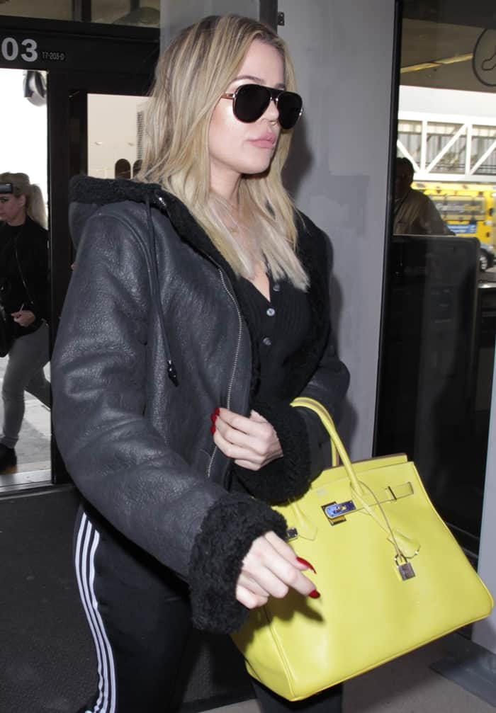 Khloe Kardashian's lime colored Hermès handbag