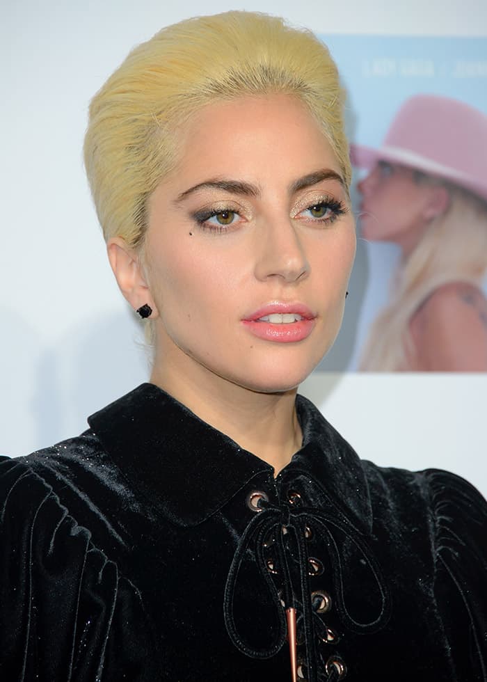 Lady Gaga kicked off the holiday season with a surprise concert on the roof of London’s Westfield shopping center in London