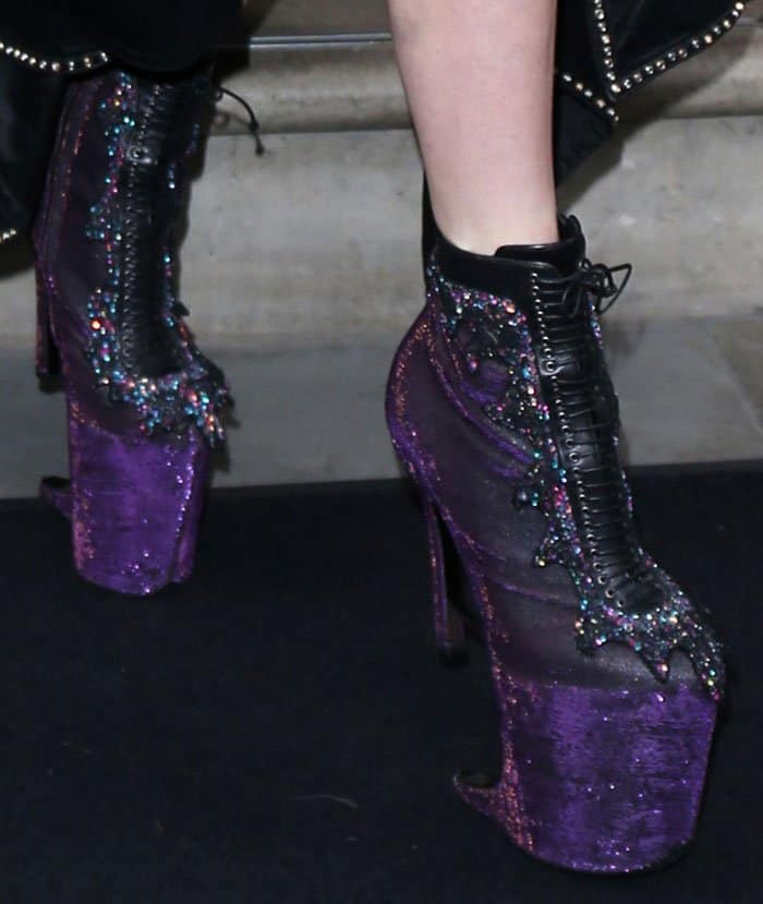 Lady Gaga's feet in gothic-looking purple boots