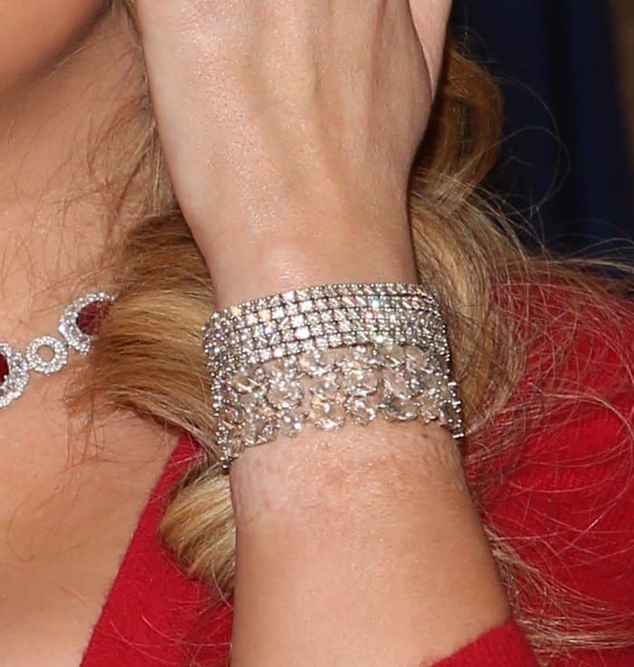Mariah Carey wearing sparkling bracelets on both wrists