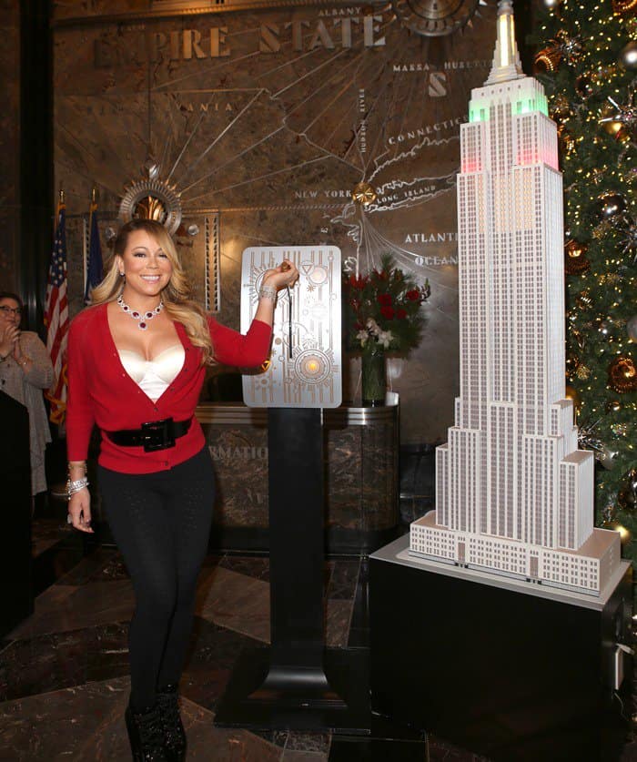 Mariah Carey switches on the Empire State Building’s Christmas lights in New York on December 6, 2016