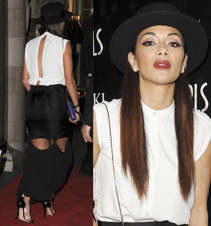 Nicole Scherzinger shows off her edgy style at the Dreamgirls press night in a deconstructed black skirt and chic white top, paired with her black Gianvito Rossi pumps and a bold black hat