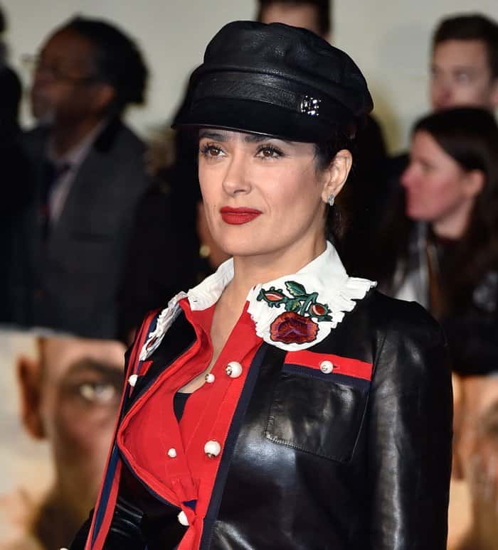 Salma Hayek showcased her tough side with a military chic Gucci ensemble