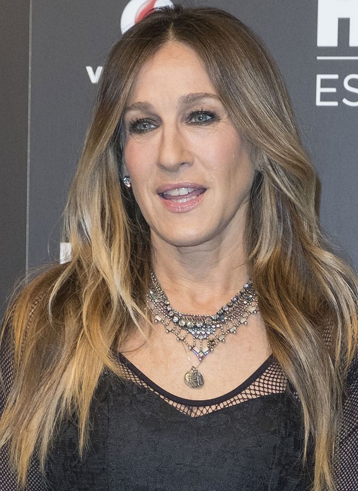 Sarah Jessica Parker complements her soft waves with a stunning layered necklace