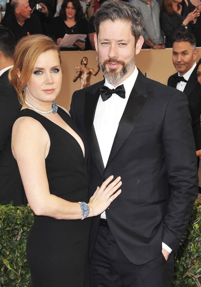 Amy Adams cuddles up to her husband, Darren Le Gallo