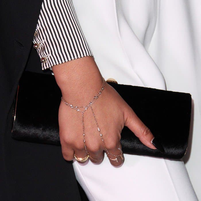 Chanel Iman shows off her box clutch and hand jewelry
