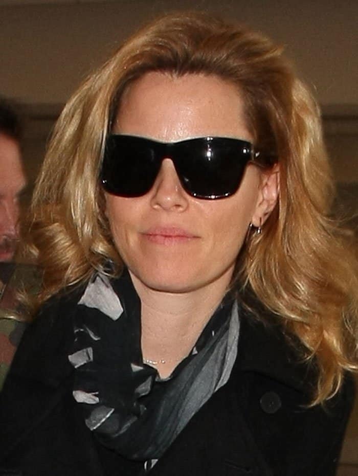 Elizabeth Banks Travels in Jimmy Choo 'Youth' Boots