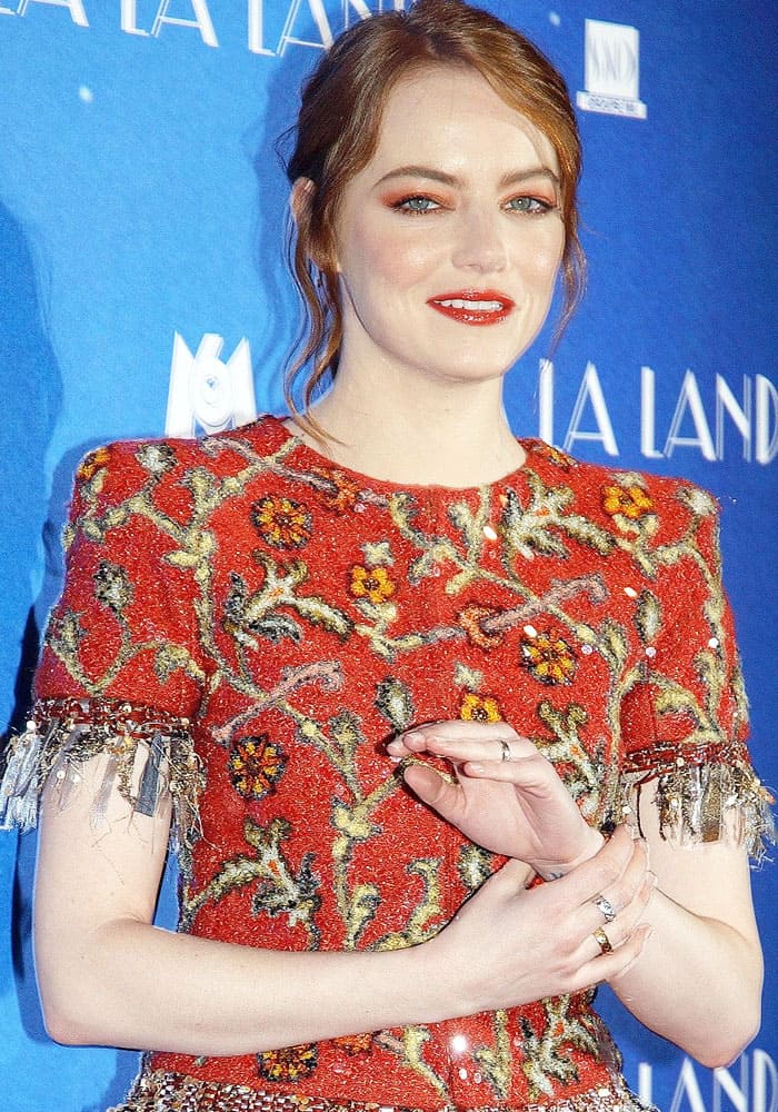 Emma Stone, fresh off her Best Performance by an Actress in a Motion Picture - Musical or Comedy win at the 2017 Golden Globes, graced another red carpet with her undeniable charm and style