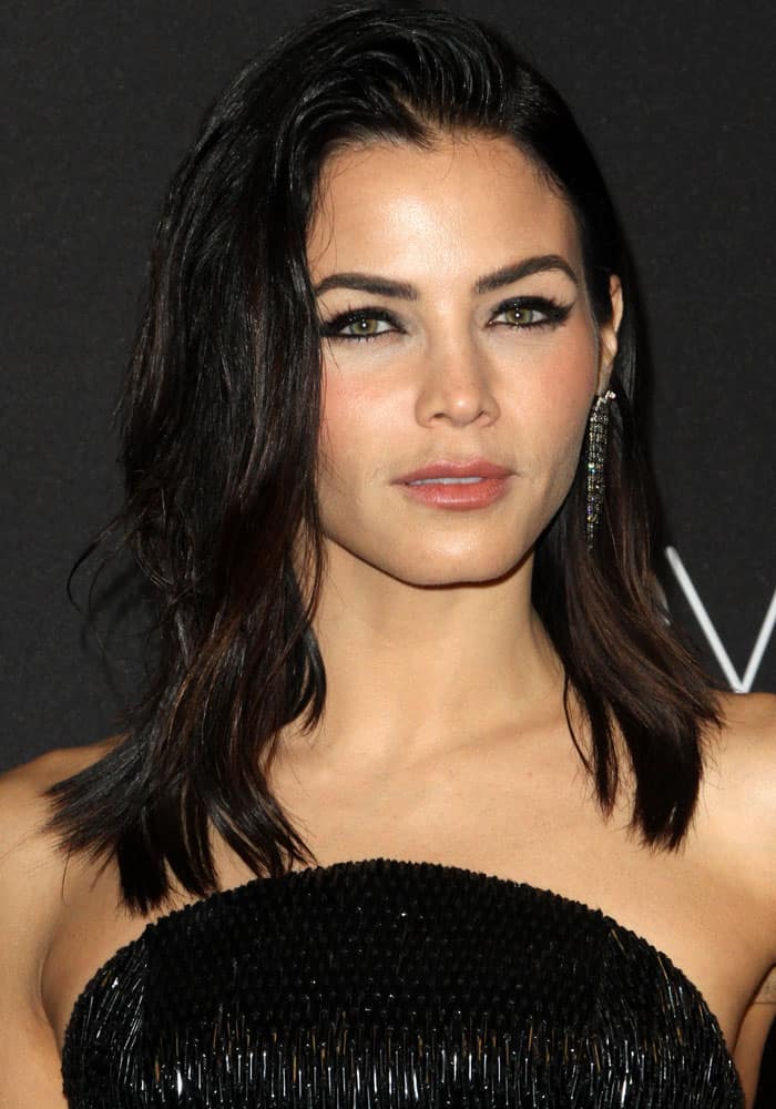 Jenna Dewan stuns in a sleek black beaded strapless gown, complemented by her bold earrings and soft, natural makeup