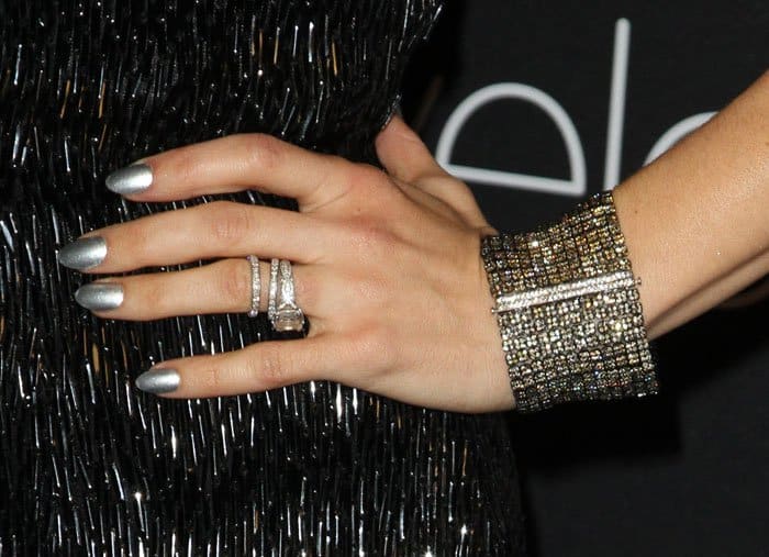 Jenna Dewan complements her sleek look with minimal jewelry and a metallic silver manicure