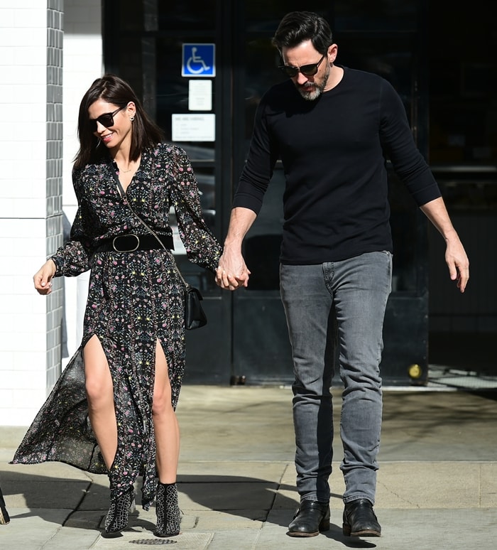 Jenna Dewan adds a stylish edge to her lunch date look in studded ankle boots paired with a flowy floral dress, walking hand in hand with Steve Kazee at Joan's on Third in Los Angeles