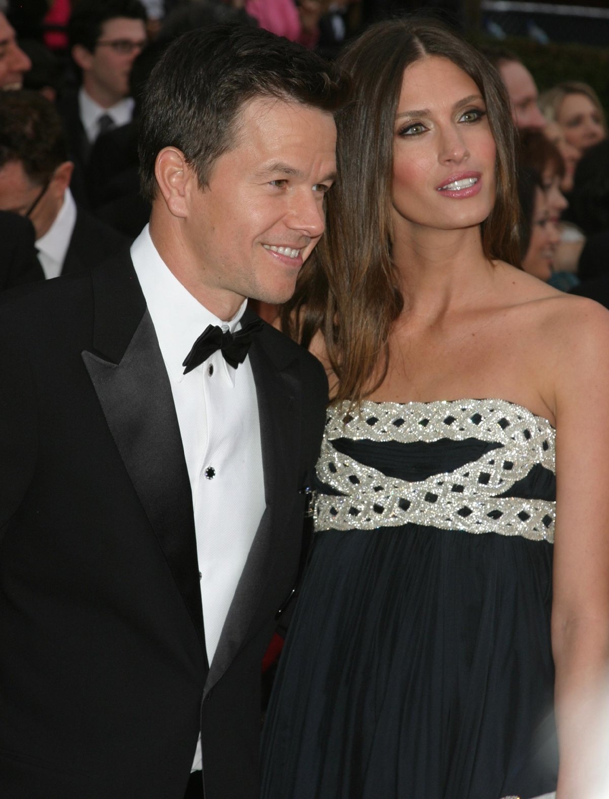 Actor Mark Wahlberg in a Giorgio Armani tuxedo and his wife Rhea Durham in a Marchesa dress at the 79th Annual Academy Awards