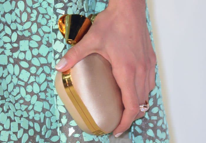 Nina added some luxe to her quirky look with a Jimmy Choo clutch