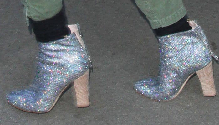 Not your typical running shoes: Sarah Jessica dashed away in silver glitter mesh SJP "Minnie" boots