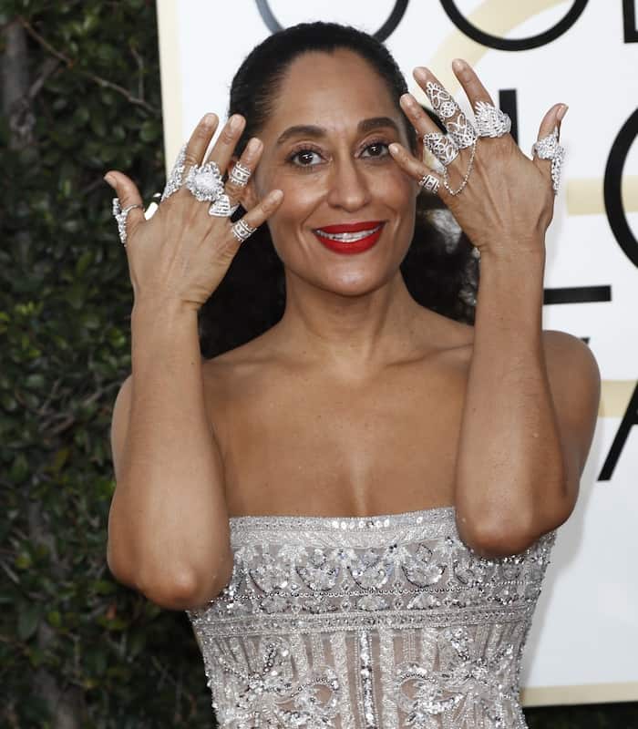 Tracee Ellis Ross accessorized with stacks of rings and opted for light makeup