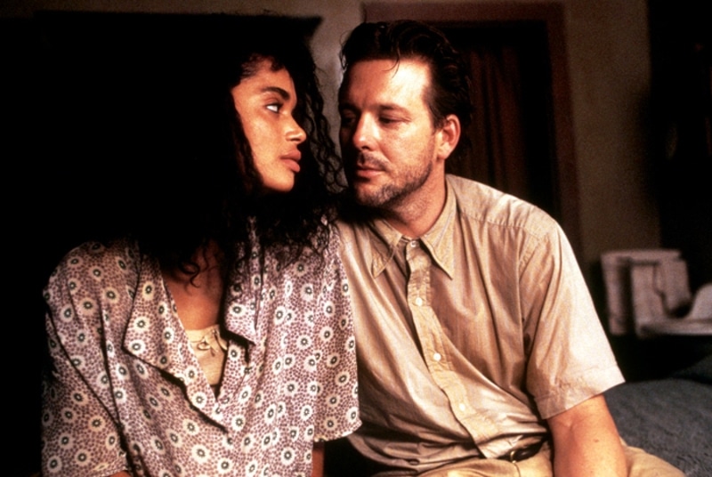 Mickey Rourke as Harry Angel and Lisa Bonet as Epiphany Proudfoot in the 1987 American neo-noir psychological horror film Angel Heart