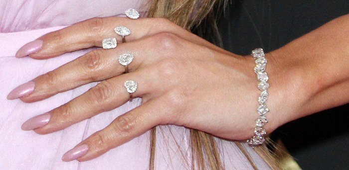 JLO wearing a Butani diamond bracelet and rings