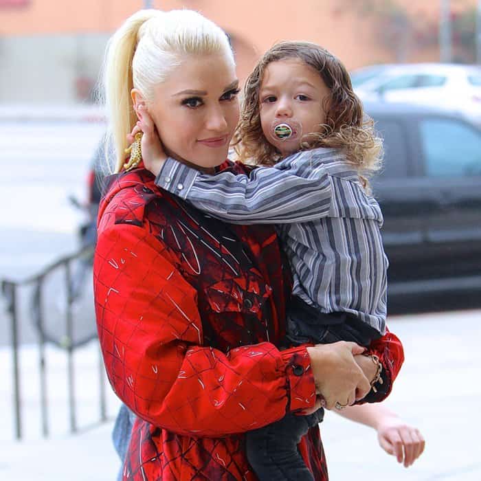 Gwen Stefani carries her son, Apollo Bowie Flynn Rossdale