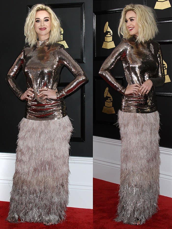Katy Perry wore a Tom Ford Fall 2016 ensemble featuring a gold sequined top, feathered skirt, messy platinum hairdo, and Lorraine Schwartz jewelry, as styled by Jamie Mizrahi