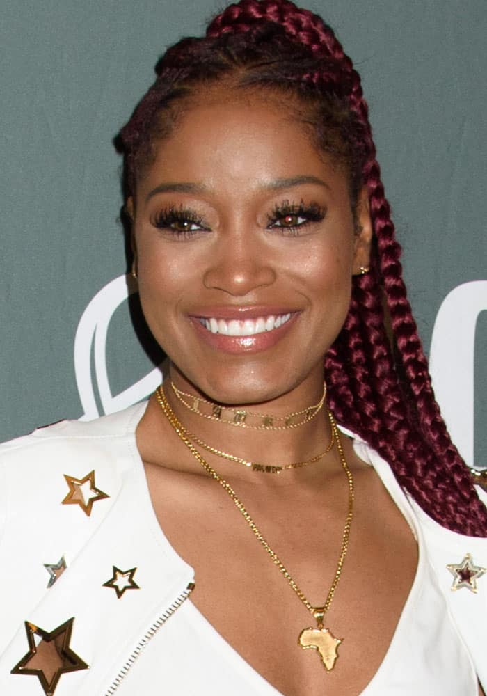 Keke Palmer wears a beautiful Africa necklace to promote her book "I Don't Belong to You: Quiet the Noise and Find Your Voice" at Barnes & Noble