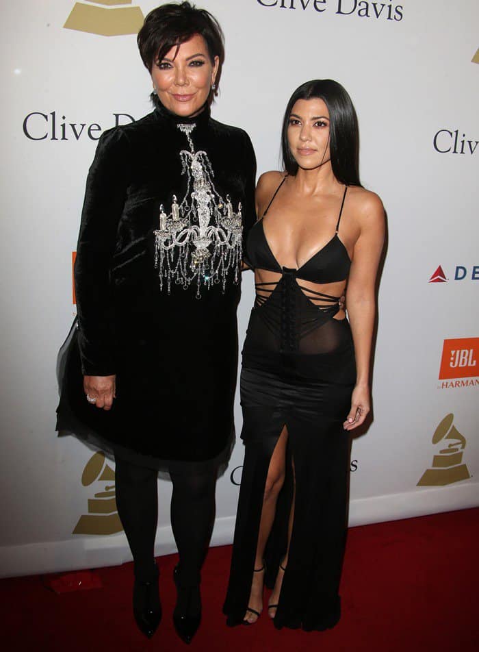 Kris Jenner demonstrates elegant sophistication in a velvet turtleneck dress, while Kourtney Kardashian opts for bold glamour in a daring cutout gown paired with strappy heels, showcasing contrasting yet complementary red-carpet styles
