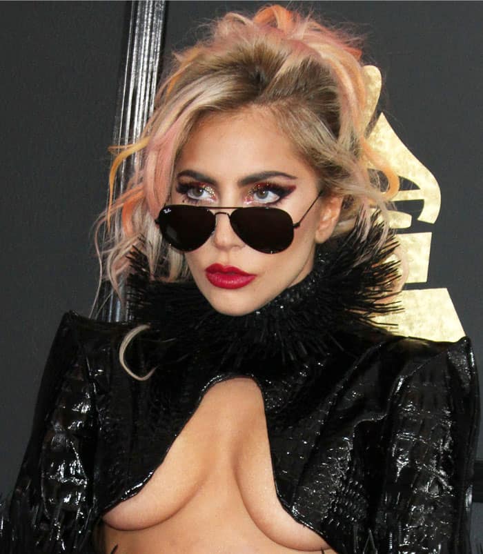 Lady Gaga lets it all hang loose in a cropped embossed jacket